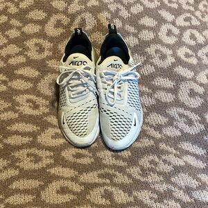 White womans Nike shoe